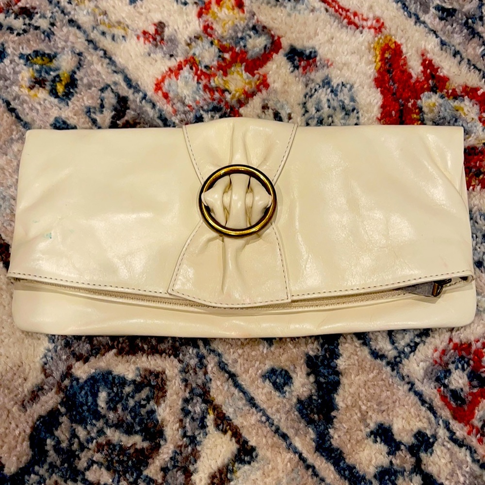 Cream colored Hobo international clutch